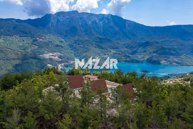 Alanya Üzümlüde 1.269 m² Tarla İçinde 2 Adet Havuzlu 3+1 EV